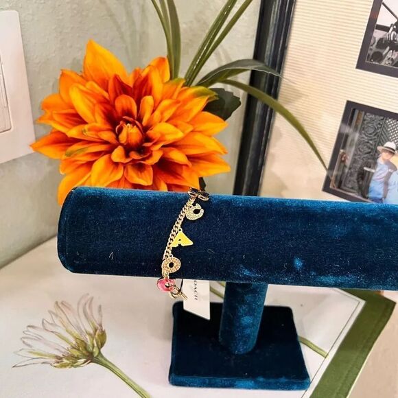 NWT COACH PavĂ© CrystalâEnamel Logo Charm Signature Letters Bracelet Gold #TSBR - Picture 8 of 8